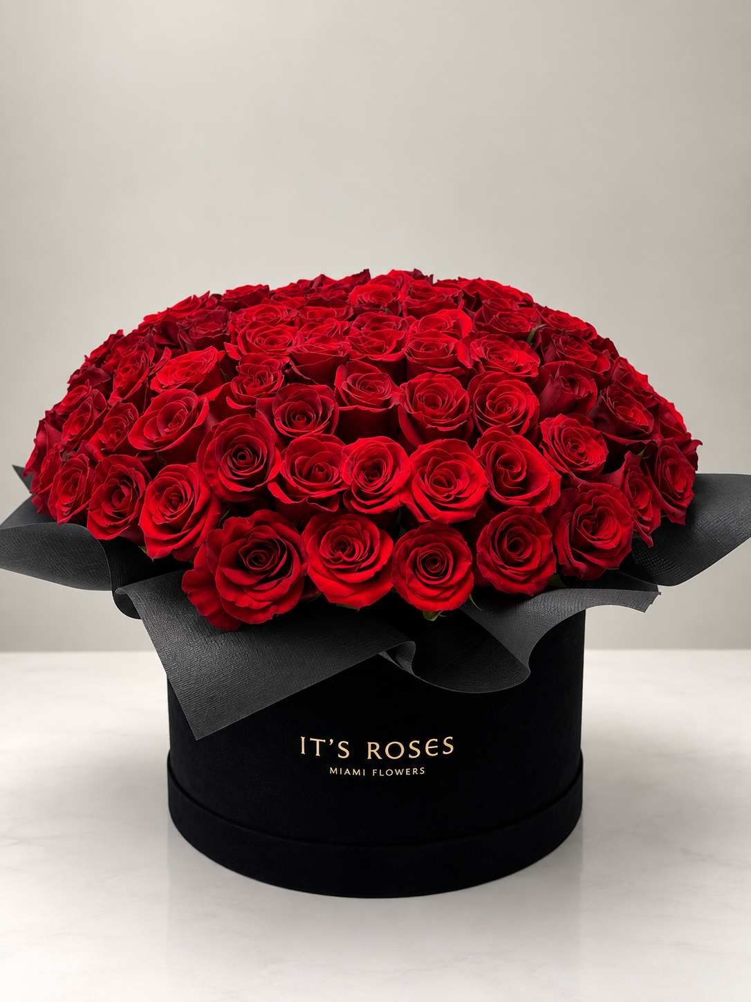 100 Red Roses in Luxury Black Box