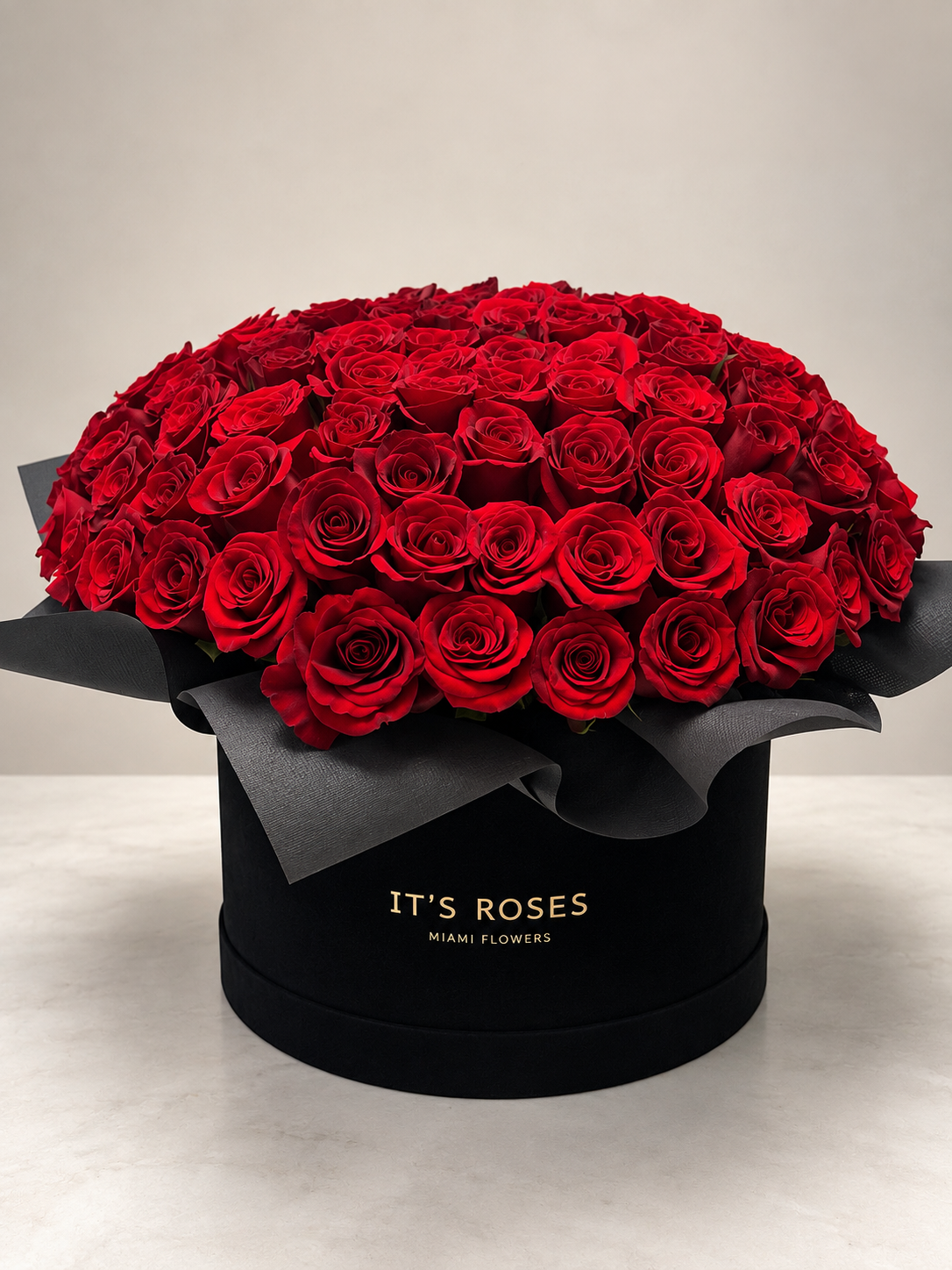 100 Red Roses in Luxury Black Box