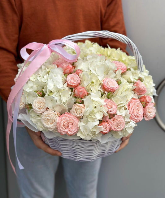 Basket of hydrangeas &roses